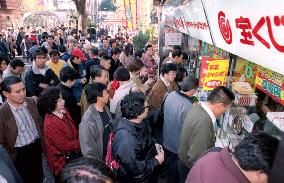 Crowds assemble to buy annual 'Jumbo Lottery' tickets